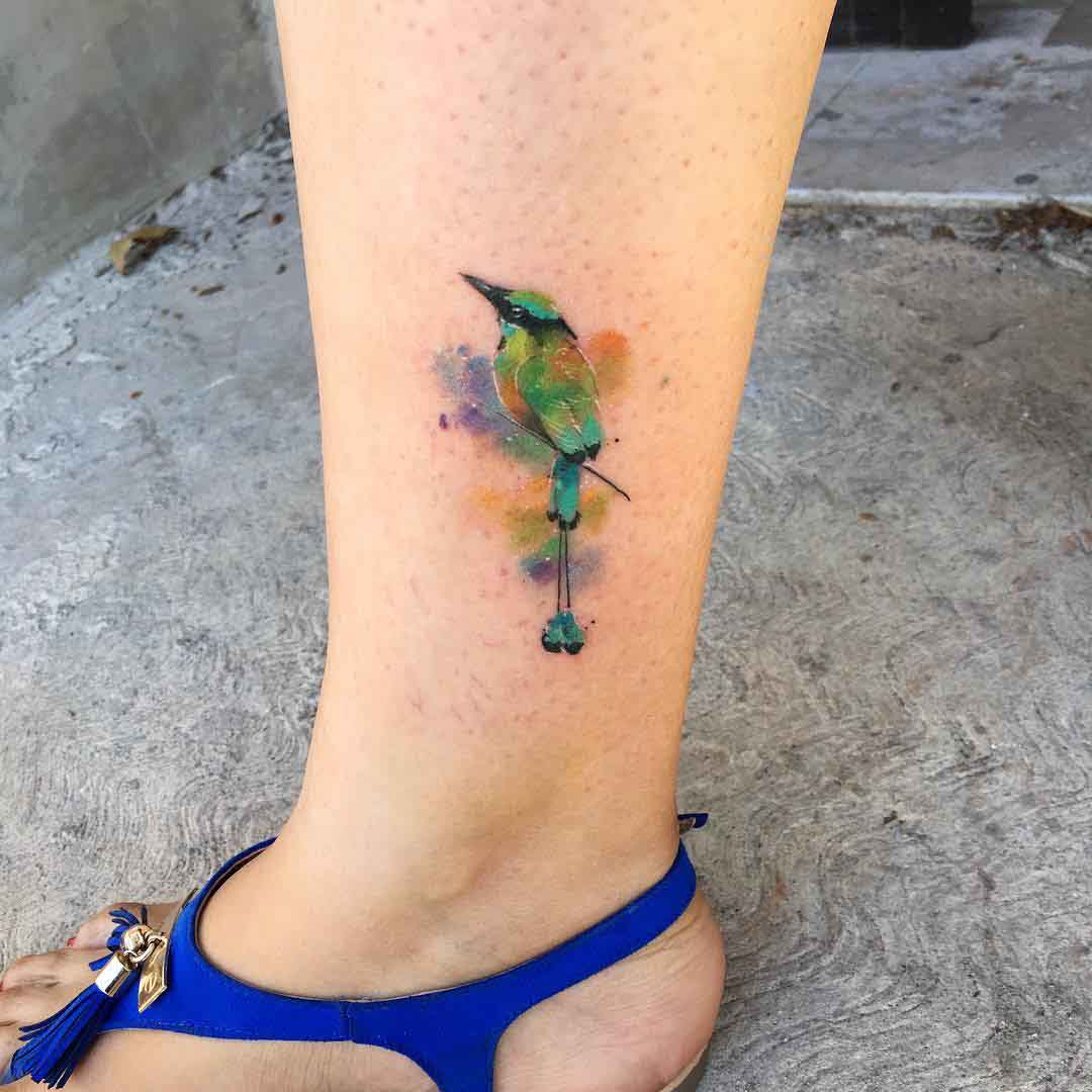 ankle tattoo small green bird